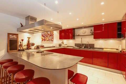 modern open kitchen with island bar