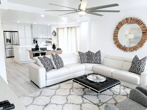 Light & Bright Modern Interior Features Leather Sectional with Queen Sleeper