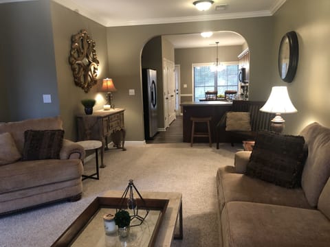 Spacious living room open to the kitchen