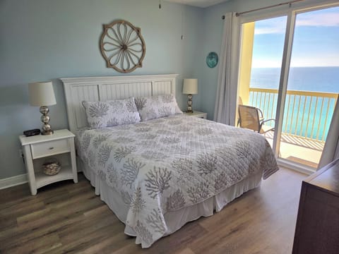 King bed with new bedding.  Private balcony