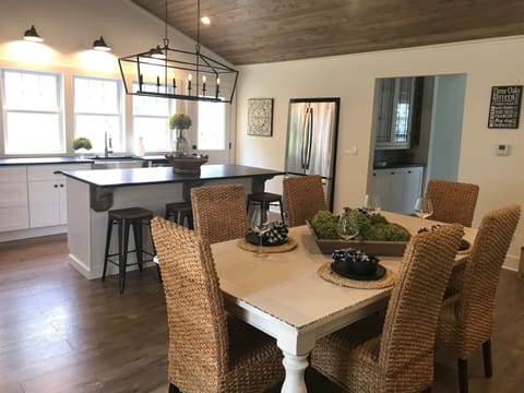 Dining table comfortably seats 6-8.