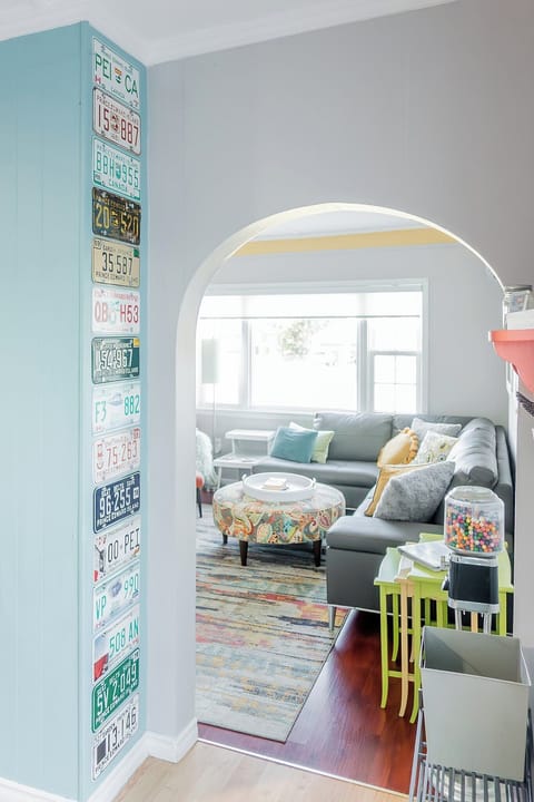 Step through a welcoming entryway that leads from the kitchen to the living room