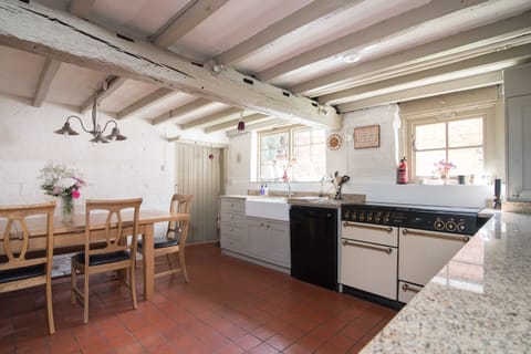 Stone House kitchen with new cabinets and drawers and sink