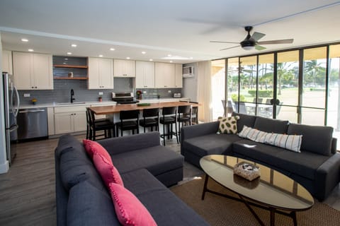 Open concept living and kitchen. Large slider doors out to the lanai!