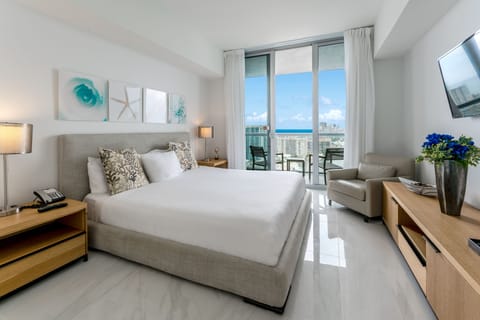 Luxurious One Bedroom Apartment with King size bed and marble floors. Master Bedroom includes LED TV, marble floor balcony and walk-in closet.
