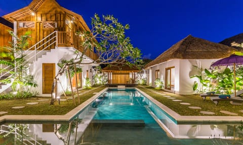 Private Pool illuminated at night 