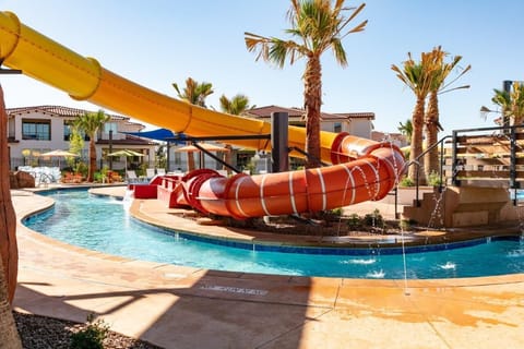 Water slide and lazy river - access to the pool area is just steps from this villa's patio