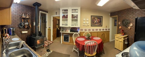 Full Kitchen  has electric heater and full size stove and refrigerator.