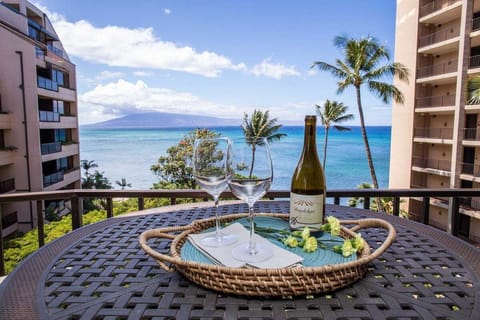 Sip wine on balconies where ocean views meet palms and breeze.
