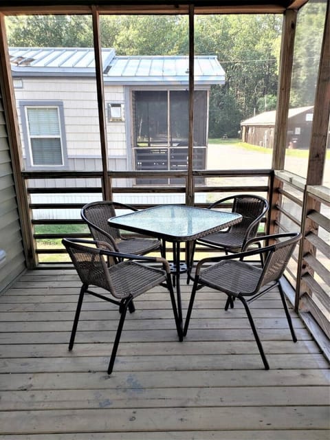 Screened porch with outdoor seating