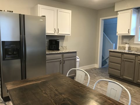 Kitchen Refridgerator and Coffe Maker that makes a full pot or uses KCups.