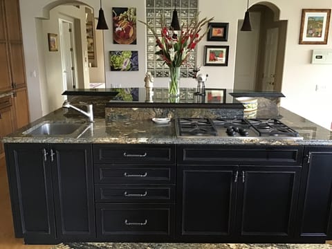 Exits from the kitchen to the bar and dining area