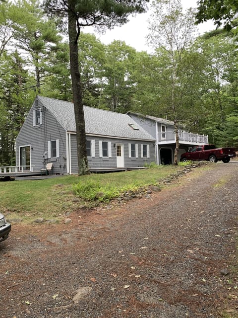 Pic from the road. Property is tucked away in the woods in a private area.