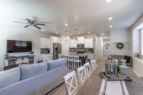 Living Room View - With an open and spacious floor plan, the Dining Room and Kitchen can accommodate meal preparations for groups large or small.