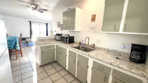 Full kitchen with range/oven and full size fridge