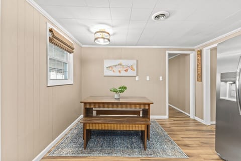 Plenty of space to cook, eat, and enjoy time together inside, on back porch, or 