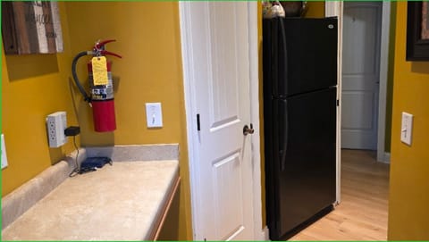 Additional refrigerator in kitchen