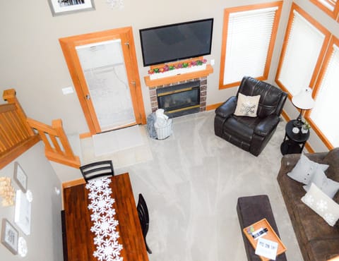 Main level living and dining area with sleeper sofa