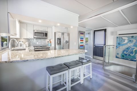 Quartz countertop galley w/ well appointed kitchen for add on Chef visit