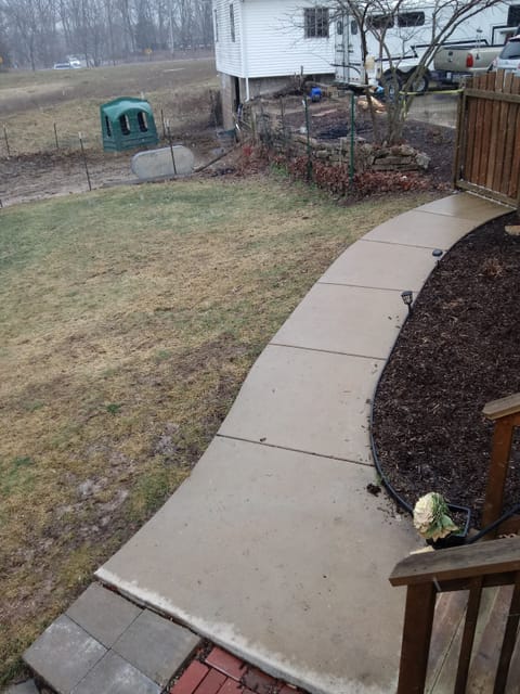 Solar lights on the pathway down to the patio/entryway