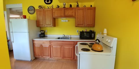 Bright and Cheery kitchen, with all you will need for your stay.