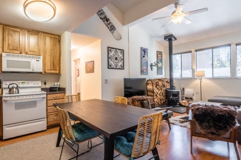 Living Room / Queen Sleeper Sofa / Wood Burning Fireplace / Flat Screen TV / Dining Table for 4