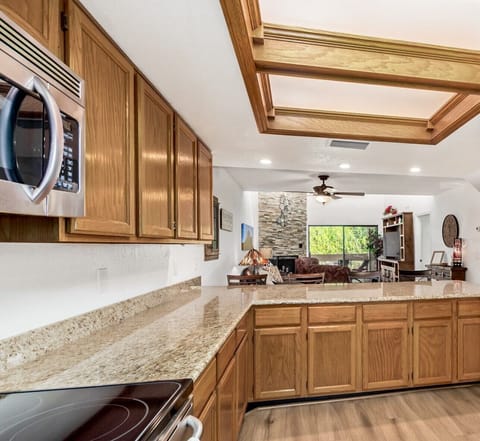 Fully stocked with matching dishes, flatware, utensils and handy kitchen gadgets