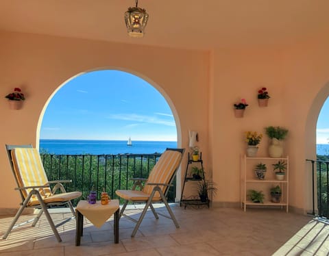  Views from the terrace over the sea, Gibraaltar, and Morocco.