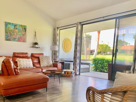 Living Room looking out to back patio on the golf course