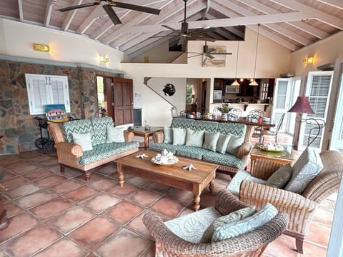 Looking towards the entrance, dining area, and kitchen