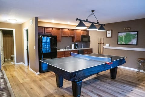 Full size fridge and commercial ice maker on this level as well as 2 Bd & 1 BA.