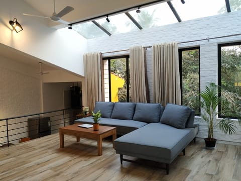 Living room with Skylights - Just lay back & watch the clouds passing by.