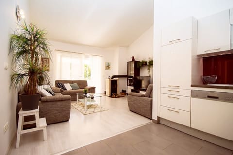 Kitchen area is connected with dining and living room.