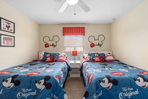 Double beds decorated in Mickey Mouse