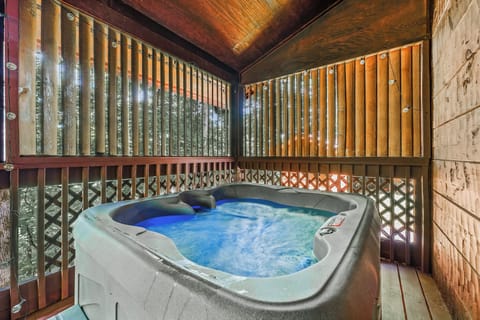 Relax in your spa-style hot tub, rain or shine—just you, the trees, and total seclusion.
