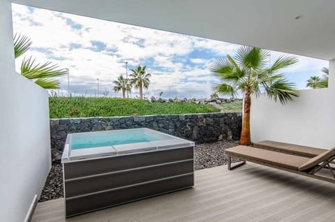 Soak in the private Jacuzzi in our luxe suite!