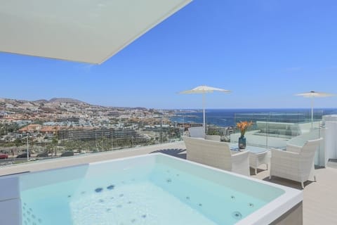 Soak in your private hot tub after a wonderful day.