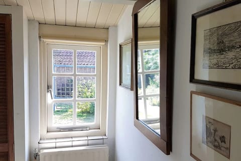 passage overlooking the garden and towards downstairs WC