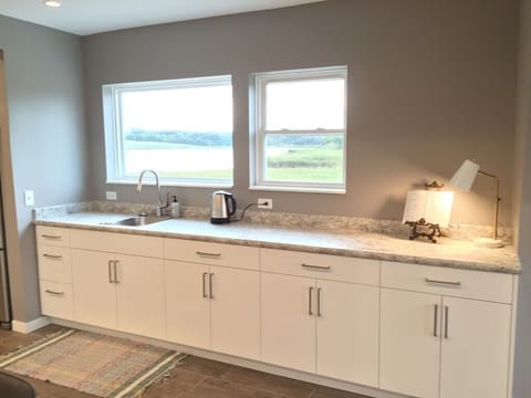 Extra counter space for cooking in the main floor kitchen - great views too! 
