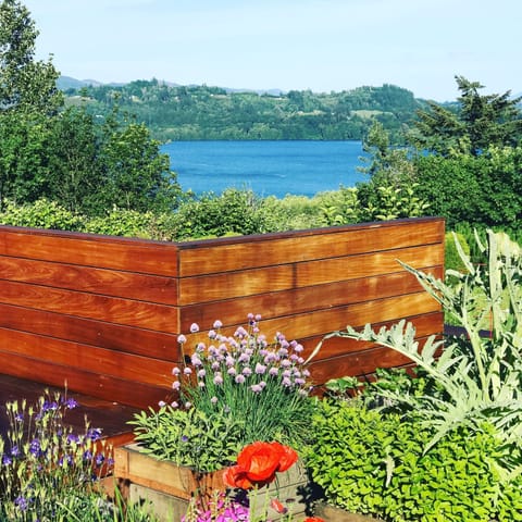 Deck with lake + mountain view