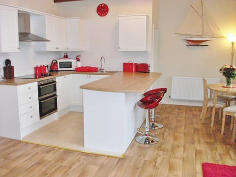The modern fitted kitchen is well equipped | Watch House, Fowey