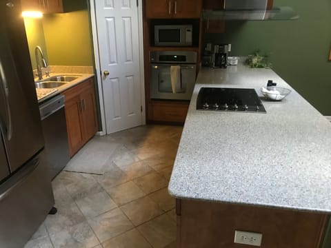 Fully stocked kitchen. Keurig and regular coffee pot. Toaster, blender, etc