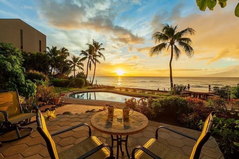 Stunning sunset view from a private patio with breathtaking ocean views