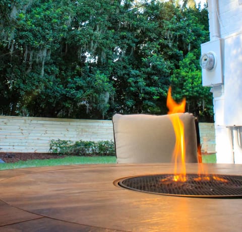 Find your oasis in the spacious backyard with a hot tub and two firepits.