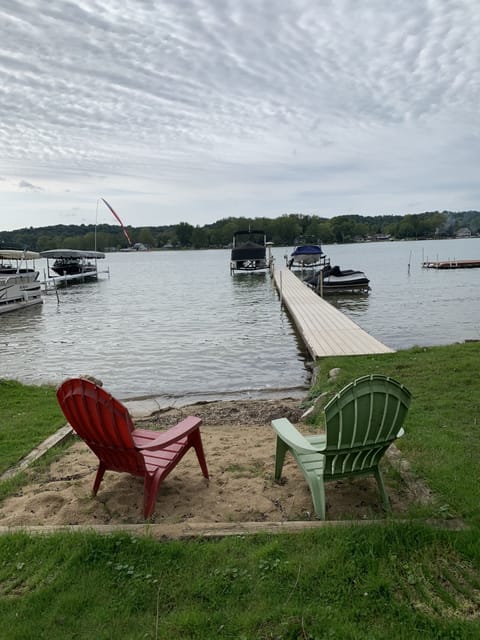 Small beach for kiddos (may need to be raked to enjoy fully).  Dock for fishing!