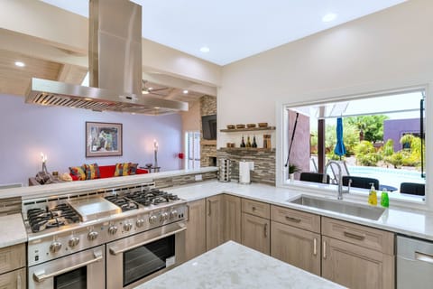 Gourmet Kitchen: 6 burner 48" propane range w/2 ovens; all cookware provided