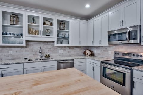 Custom cabinetry and Quartz counters just ooze Luxury