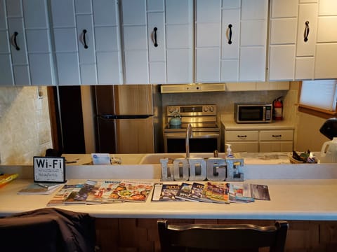 Kitchen new stainless fridge and stove
