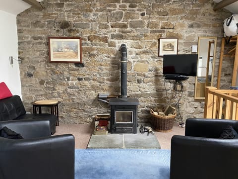 Upstairs open plan studio living area