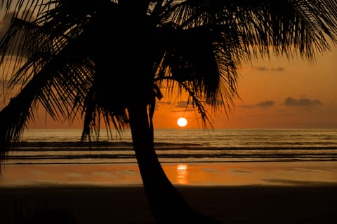 Sunset on El Castillo Private Island Beach